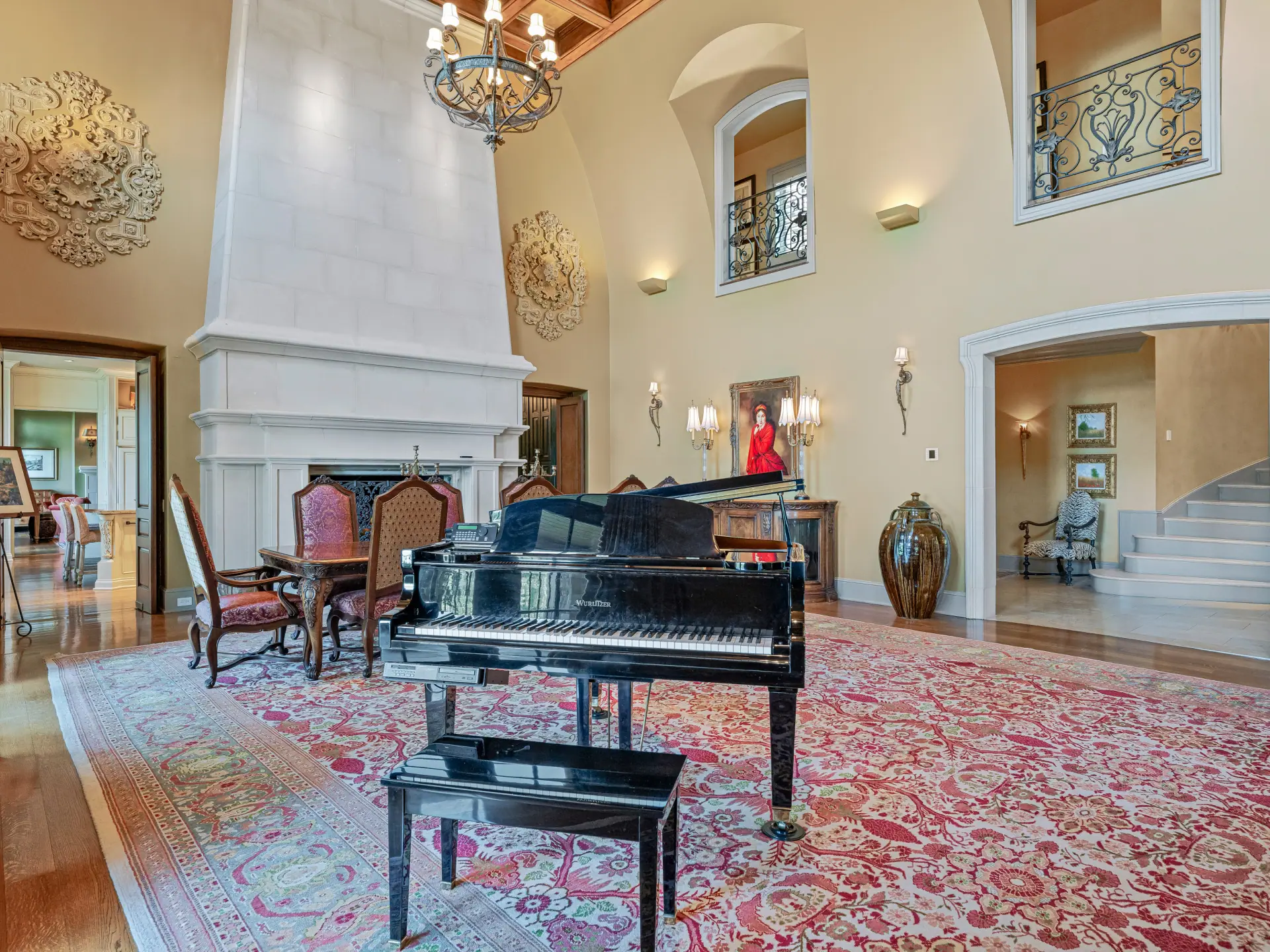 Grand piano beside the great room fireplace