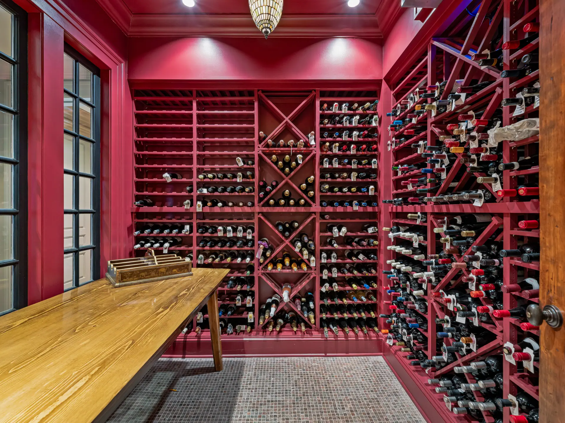 Climate-controlled wine cellar with red racking
